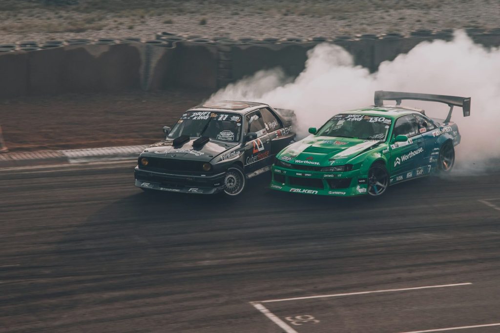 two drift cars sliding together